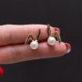 Toptan Altın Renk Tavşan Kulak Tasarımlı İnci Küpe | Kadın Çelik Takı, Minimalist ve Şık Model Toptan Altın Renk Tavşan Kulak Tasarımlı İnci Küpe | Kadın Çelik Takı, Minimalist ve Şık Model