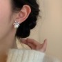 Gümüş Fiyonklu İnci Tasarımlı Zirkon Taşlı Küpe | Kadın Çelik Takı, Şık ve Gösterişli Model Gümüş Fiyonklu İnci Tasarımlı Zirkon Taşlı Küpe | Kadın Çelik Takı, Şık ve Gösterişli Model